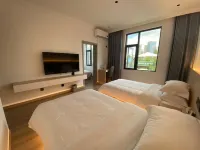 Maitreya Ruixiang Hotel - شرفة