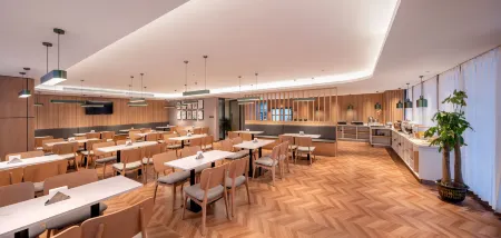 Shankee Tea Style Hotel (Longchang Jinsha Shidaiguangchang) Отели рядом с достопримечательностью «Chuannan Normal College for Childhood Education»