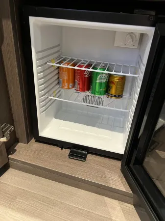 Xihua Shuangchuang Business Hotel Отели рядом с достопримечательностью «Jizi Reading Platform»