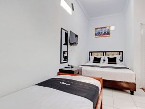 Capital O 92929 Hotel New Tirta Kencana Syariah