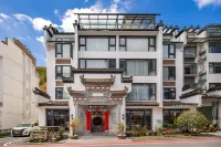 Floral Lux Hotel · Yuelan Mountain Hotel (Huangshan Scenic Area Transfer Center Branch) Отели рядом с достопримечательностью «Пунг-Бридж»