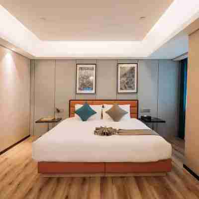 温嶺國際大酒店(曙光大廈店) Rooms