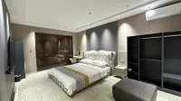 Yichun Xinqian Hotel - bar