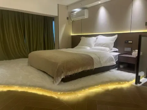 Duoerman Apartment (Harbin Ice and Snow World Shimao Avenue Subway Station Branch) Отели рядом с достопримечательностью «Shuige Yuntian»