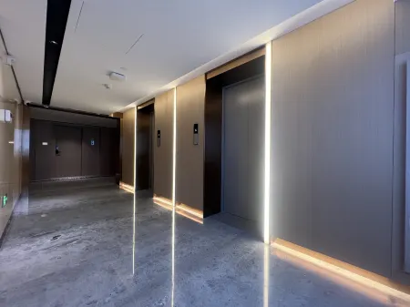 Sanhe Hotel (Wanda Plaza) Отели рядом с достопримечательностью «Shangrao Botanical Garden»