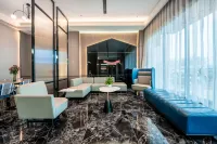 Echarm Hotel (Zhanjiang Xuwen Mulan Avenue Xinduhui Plaza)