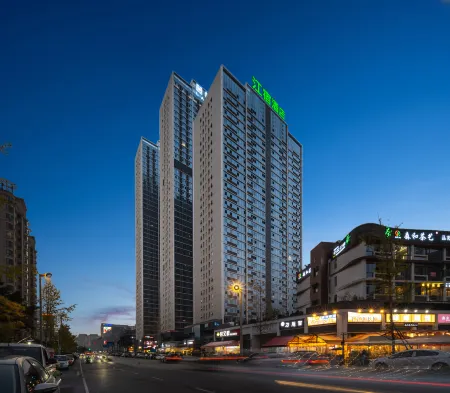 Jiang Su Hotel (Wenjiang Pearl River Square Guanghua Park Subway Station Branch) Отели рядом с достопримечательностью «Chengdu Normal University»