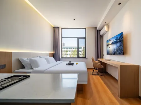 Hanlin Hotel (Weihai High-Speed Railway North Station Huoju 8th Street) Отели рядом с достопримечательностью «Xiaoshidao Fishing Beachcombing Park»