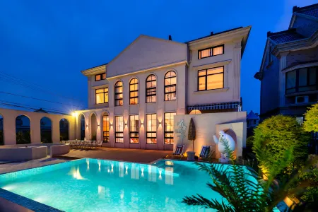 Shanghai In Prime Years  Countryside  Home Hotel Отели рядом с достопримечательностью «Shanghai Wild Animal Park»