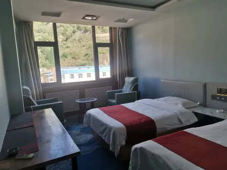 Wuqi Jiujiuhong Hotel Отели в г. Уци