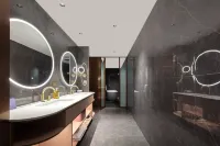 Manxin Hotel (Starlight Night Market Branch, Gaozhuang Xishuangjing, Jinghong, Xishuangbanna) - bar