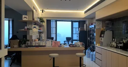 Yunxi Serviced Apartment (Yiyang City College) Отели в г. Иян