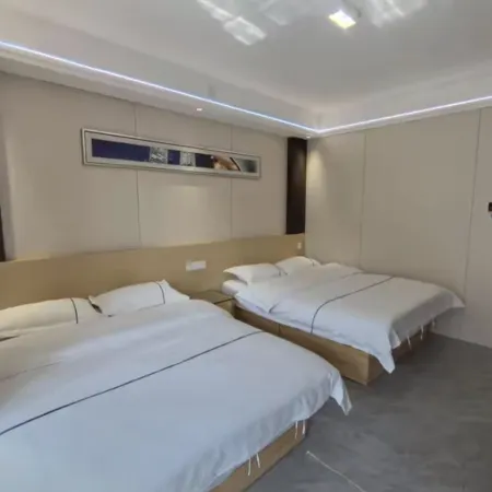 Ruxin Business Hotel (Chengwu Shengshi International Building Materials City)