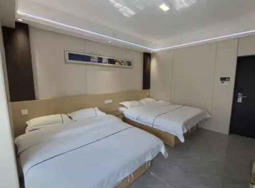 Ruxin Business Hotel (Chengwu Shengshi International Building Materials City)