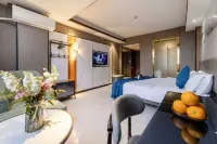 Xinning Jincheng Hotel (Langshan Avenue West Bus Station)