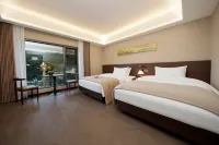 Jiuzhaigou National Park Muhe Hotel - 2-نجوم