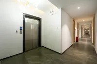 Quanzhou Fuxingyi · Eaven Hotel (West Lake Park) - ที่มีที่จอดรถ