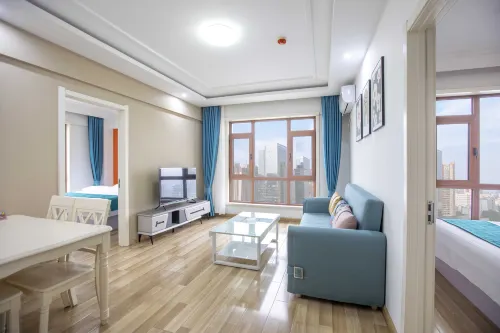 Dalian Yihe Zhixing Holiday Apartment - مطابخ