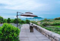 Four Islands Haitang B&B - بار