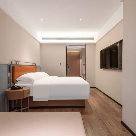 Phoenix Holiday Hotel (Xuefeng Plaza Branch), Dongkou County