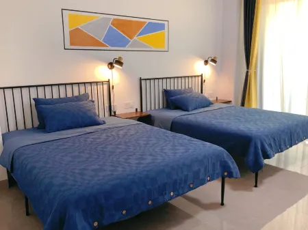 Laiye Homestay (Wenchang Longlou Branch) Отели рядом с достопримечательностью «Yunlong Bay»