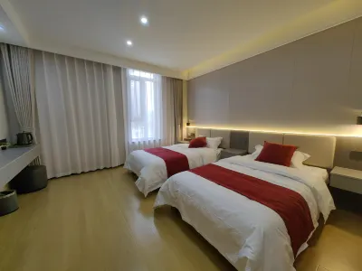 Qixi Hotel (Mudanjiang Railway Station) Hotell i Aimin District