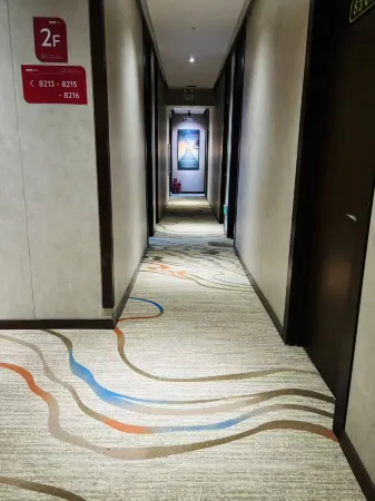 Daqing Century Tangren Express Hotel Отели рядом с достопримечательностью «Daqing Normal University»