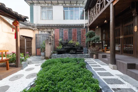 Bujian Shan · Muwa Hideaway T² Hide Bai Healing Courtyard (Dali Renmin Rd Branch) Отели рядом с достопримечательностью «Yu'er Garden»