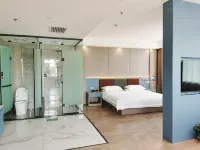 Saishang Qinyuan Village Business Hotel