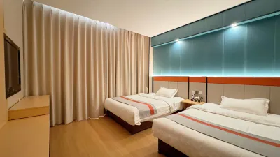 Impression Business Hotel Отели рядом с достопримечательностью «Tonglv Passenger Transport Terminal»