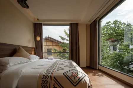 Yunmeng Xiangshe Homestay (Libo Xiaoqikong Scenic Area East Gate Ticket Office) Отели рядом с достопримечательностью «Herb Garden»