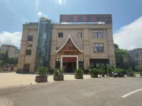 Xingyi Qiaofu Hotel - خدمة نقل من وإلى المطار