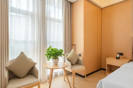 Yuechen Hotel (Xietaizi Subway Station) Отели рядом с достопримечательностью «Chongqing Institute of Public Administration»