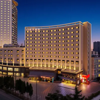 Orange Hotel (Qingdao Golden Beach Petrochemical University Branch) Отели рядом с достопримечательностью «Курс торгового центра»