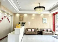 Jiangmen Yiwan Apartment with Elevator (Jiangmen East Railway Station Jianghai Square) - Inns