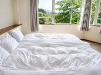 Yi Dian Yuan Maisonette Resort - balcony