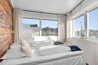 Astra Whale - Waterfront Boutique Hostel in Lofoten - parking