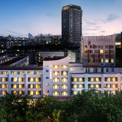 โรงแรมเอทัวร์ ศูนย์บริการรัฐบาล ถนนเหอตง ซานย่า โรงแรมใกล้ใจกลางซันหยา