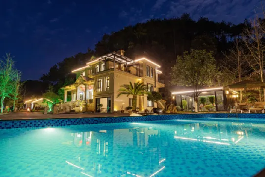 Yin Shangmeisu Отели рядом с достопримечательностью «Jiuxian Fenshuizhen Jiulong Temple»