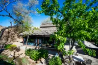 Youyouxinshe (Zhangbi Ancient Castle Scenic Area) Отели в г. Цзесю