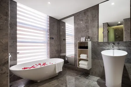 Rezen Wenlan Hotel (Zhengzhou East Station Green Twin Towers Store) Отели рядом с достопримечательностью «Henan Agricultural University (Longzihu Campus)»