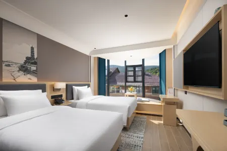 Lushan Tianhai Baitang Hotel(Guling Street Cableway Station Store)
