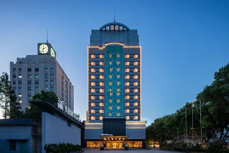 MEETADO Hotel Jiaxing Отели рядом с достопримечательностью «Xiuzhou Park»