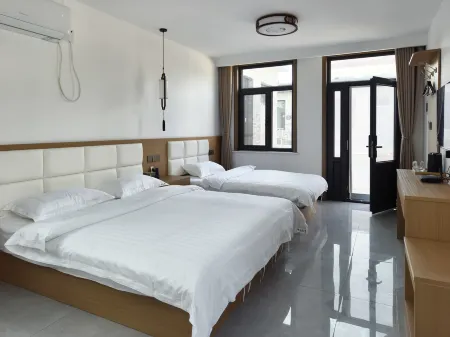 Xiongxian Xiongshan Homestay Отели рядом с достопримечательностью «Baiyangdian Lake»