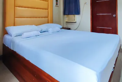 RedDoorz at Alejandro's Suites & Venue Hotels near JoRose Garden