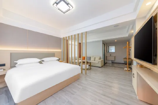 Yimi Hotel (Provincial Library Branch near Hainan Institute of Business and Technology) Отели рядом с достопримечательностью «Hainan Sports Training Hall»