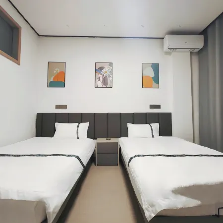 Youjian Homestay (Chengtou Town Yaqi Yuanhong Trade City)