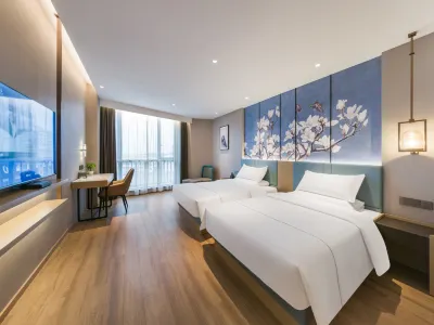 Magnolia Business Hotel (Jiaxing Nanhu Science and Technology City Branch) 자싱 호텔