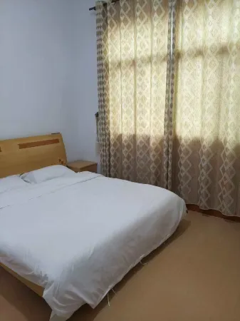 Jiaomei Bay Tidal Fisherman's House Homestay Отели рядом с достопримечательностью «Triton Bay»