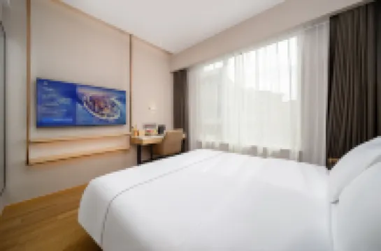 Magnolia Business Hotel (Qingdao May Fourth Square Hisense Plaza Branch) Hotels in Qingdao